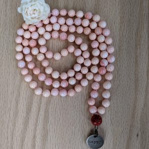 Queen Conch Shell with carved Coral Mala