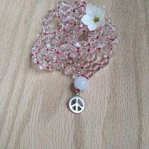 Clear quartz Crystal with carved Burmese Jade Mala