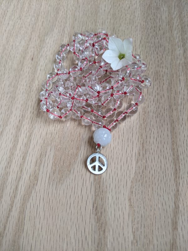 Clear quartz Crystal with carved Burmese Jade Mala